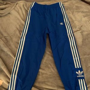 Blue Adidas track pants